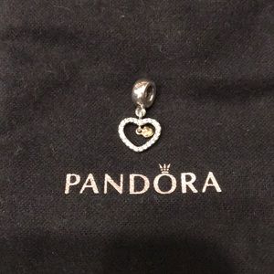 Pandora floating heart charm.